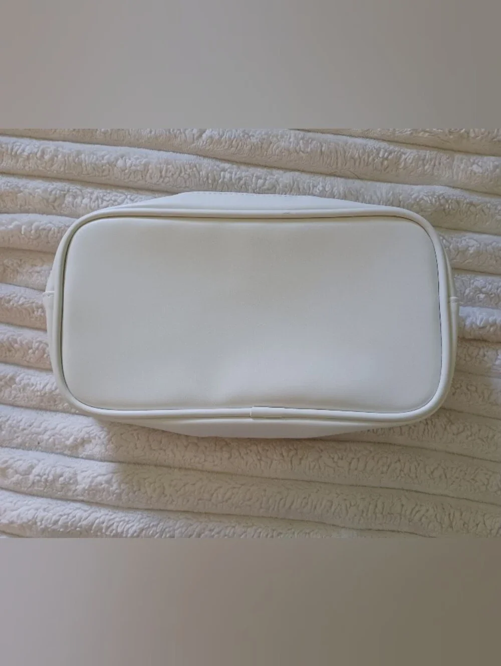 Neutrogena White Makeup Bag with Blue 'SKIN' Chenille Patch